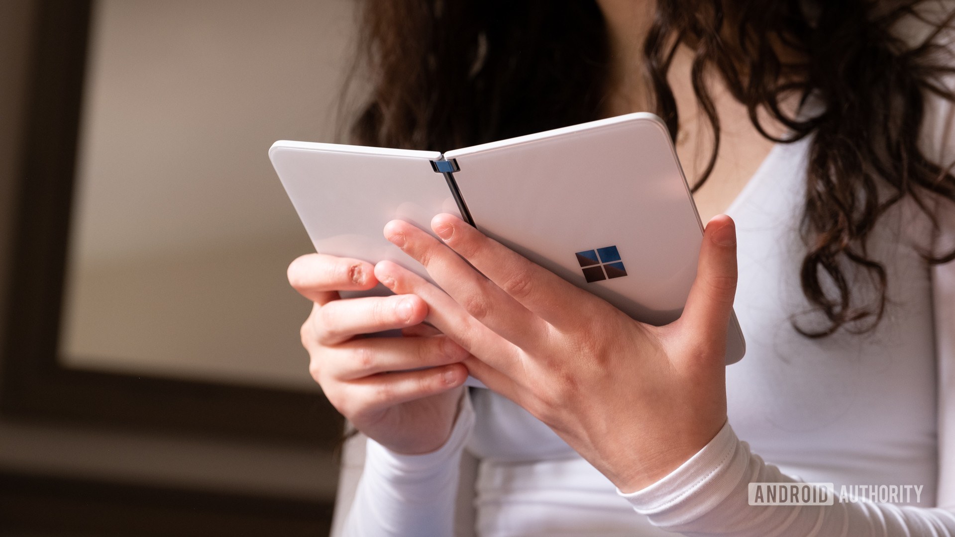 Microsoft Surface Duo in hand book mode